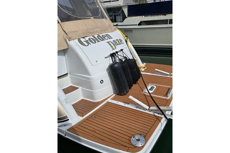 Slide: The Image of 2008 Formula 40 Performance Cruiser with teak deck and fenders, docked at marina. - 6