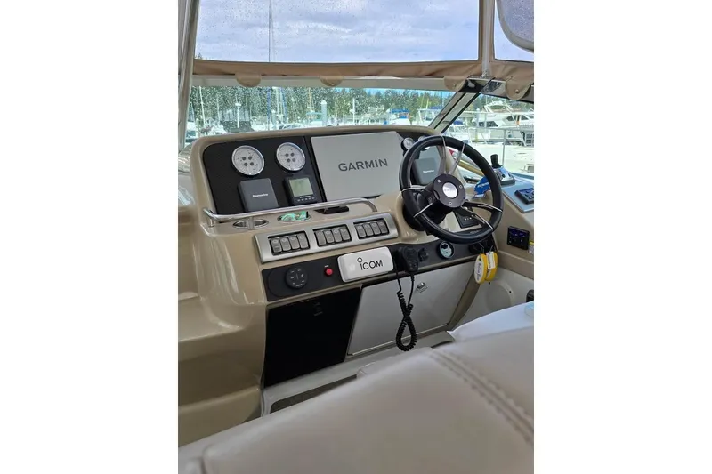 Slide: The Image of Helm of 2008 Formula 40 Performance Cruiser with Garmin navigation and Icom communication systems. - 8