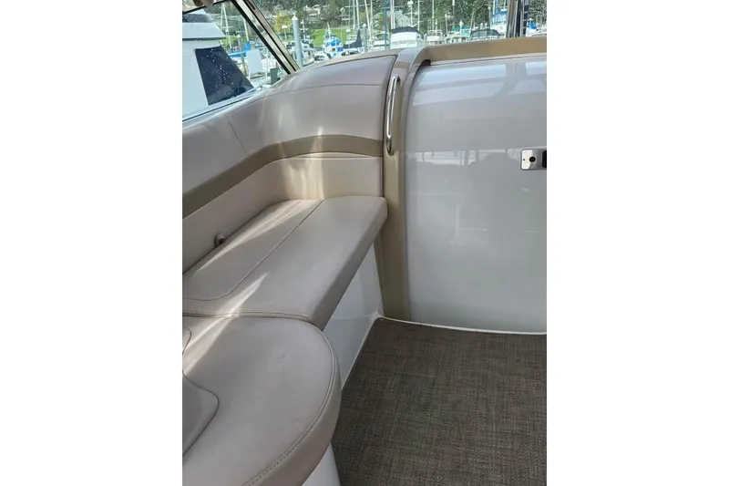 Slide: The Image of Interior seating of 2008 Formula 40 Performance Cruiser, featuring beige upholstery and sleek design. - 9