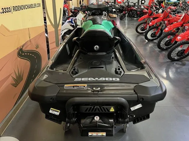 Slide: The Image of 2026 Sea-Doo GTI SE 130 jet ski in a showroom. - 5