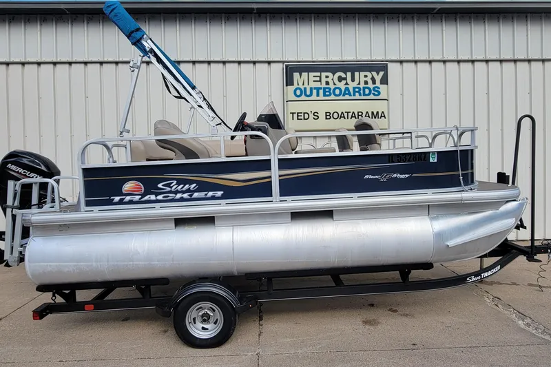 The Image of 2020 SUNTRACKER BASS BUGGY 16 XLS pontoon boat on trailer at dealership. - 0