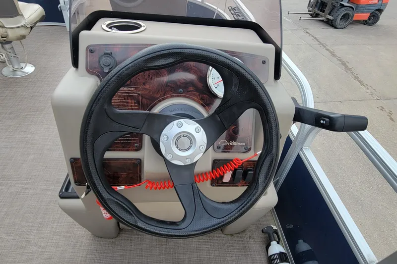 Slide: The Image of Steering console of 2020 SUNTRACKER BASS BUGGY 16 XLS pontoon boat. - 14