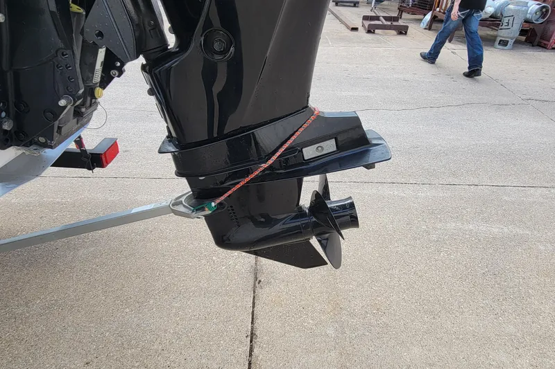 Slide: The Image of Outboard motor of 2020 SUNTRACKER BASS BUGGY 16 XLS on a trailer. - 7