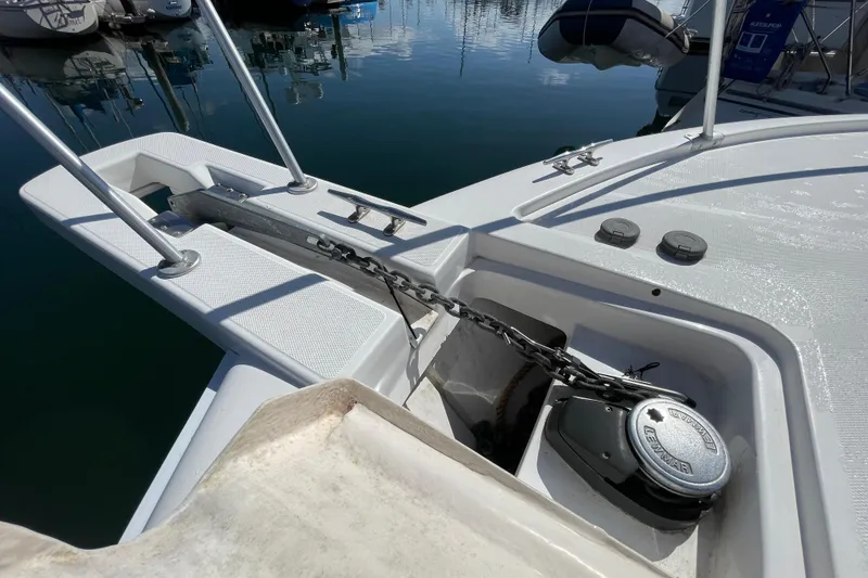 Slide: The Image of Bow of 2003 Luhrs 34 Convertible with anchor chain and winch system. - 17