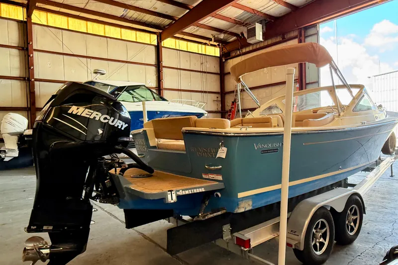 Slide: The Image of 2018 Vanquish Bristol Harbor 23 boat with Mercury engine in storage facility. - 5