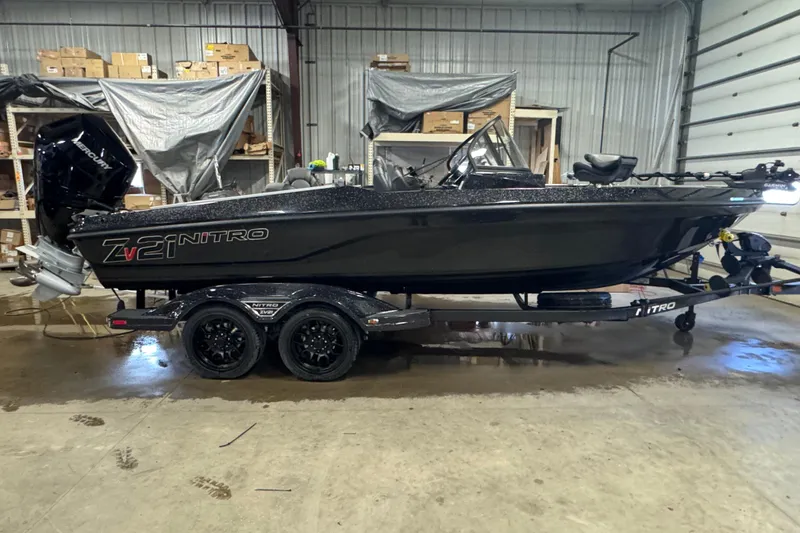 The Image of 2026 Nitro ZV21 Pro fishing boat in a warehouse setting. - 0