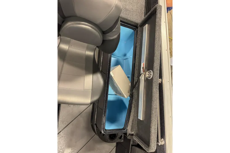 Slide: The Image of Interior view of 2026 Nitro ZV21 Pro boat storage compartment with seat detail. - 12