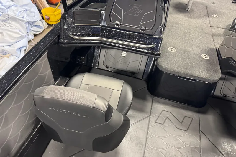 Slide: The Image of Interior of 2026 Nitro ZV21 Pro boat with sleek seating and storage compartments. - 13