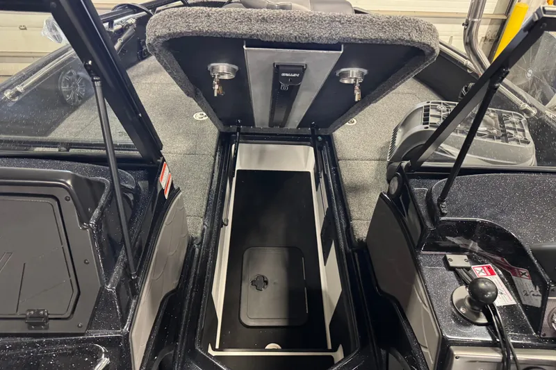 Slide: The Image of 2026 Nitro ZV21 Pro boat interior with open storage compartment and sleek design. - 15