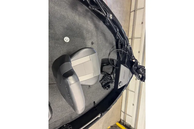 Slide: The Image of Interior of 2026 Nitro ZV21 Pro boat with seating and control panel. - 16