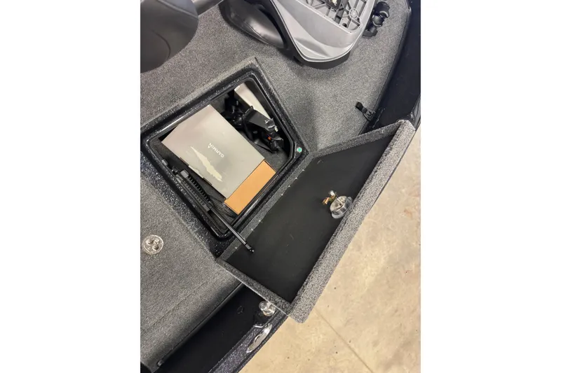 Slide: The Image of Storage compartment in 2026 Nitro ZV21 Pro boat, featuring organized equipment and accessories. - 19