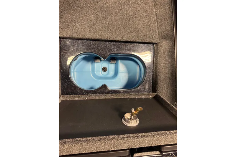 Slide: The Image of Interior view of Nitro ZV21 Pro 2026, featuring a blue compartment and metallic component. - 20