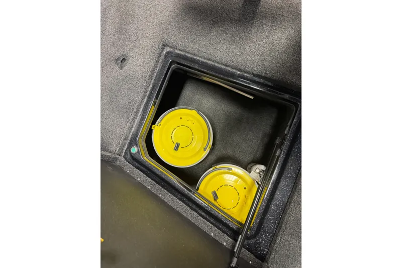 Slide: The Image of Storage compartment with yellow lids in 2026 Nitro ZV21 Pro boat. - 23