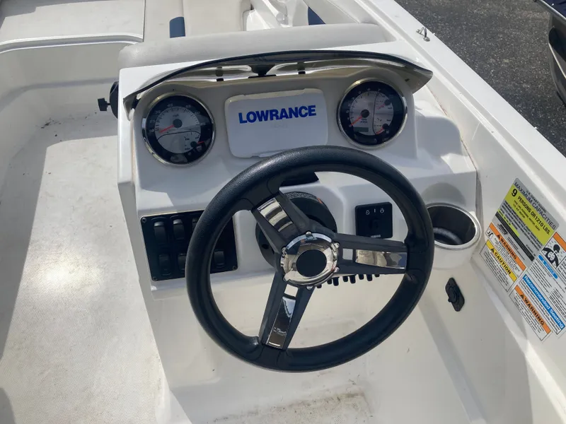 Slide: The Image of 2020 Hurricane SunDeck Sport 185 OB steering console with Lowrance display. - 10