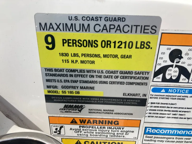 Slide: The Image of US Coast Guard capacity label for Hurricane SunDeck Sport 185 OB, 2020. - 13