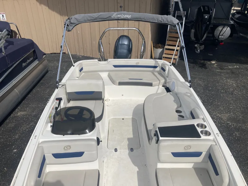 Slide: The Image of 2020 Hurricane SunDeck Sport 185 OB boat with gray canopy. - 6