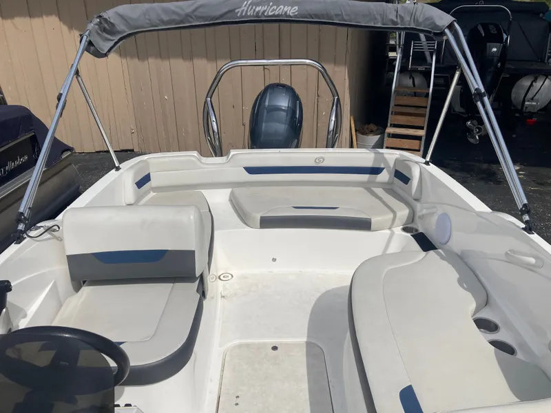 Slide: The Image of Interior of a 2020 Hurricane SunDeck Sport 185 OB boat. - 7