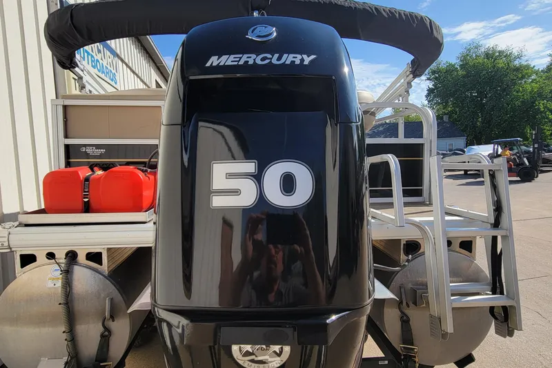 Slide: The Image of 2022 SUNTRACKER BASS BUGGY 16 XLS with Mercury 50 engine, docked outdoors. - 11
