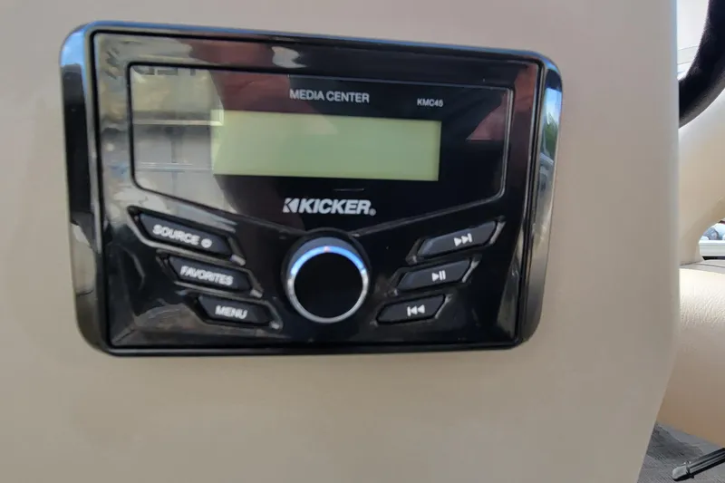 Slide: The Image of Kicker media center in 2022 SUNTRACKER BASS BUGGY 16 XLS boat dashboard. - 25