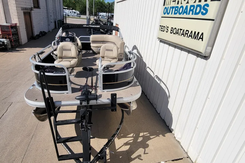 Slide: The Image of 2022 SUNTRACKER BASS BUGGY 16 XLS pontoon boat at dealership. - 5