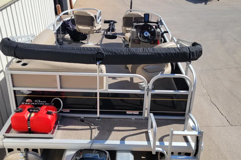 Slide: The Image of 2022 SUNTRACKER BASS BUGGY 16 XLS pontoon boat with seating and steering console. - 7