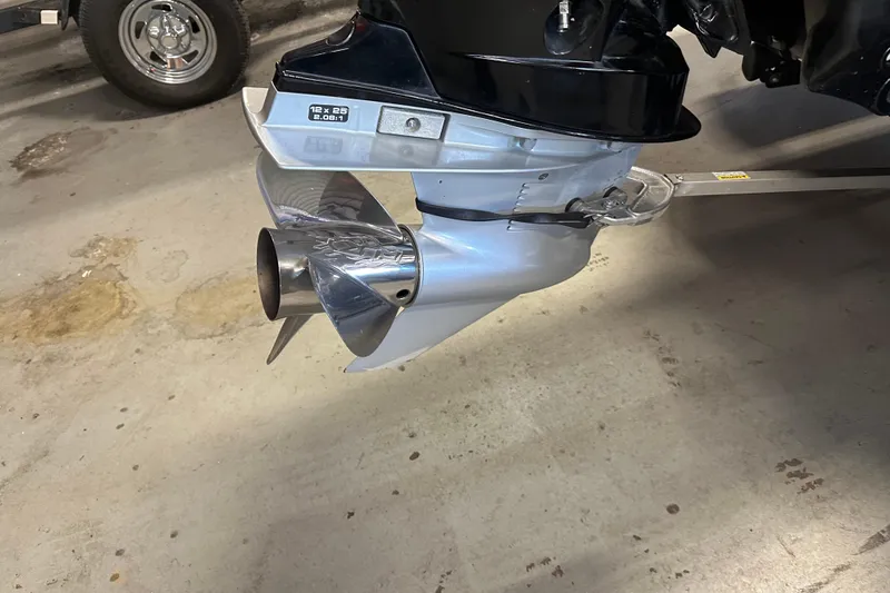 Slide: The Image of Close-up of a 2021 Nitro Z18 Pro boat propeller on a concrete floor. - 10