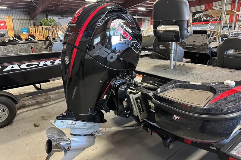Slide: The Image of Outboard motor on a 2021 Nitro Z18 Pro boat in a showroom setting. - 11