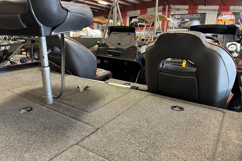 Slide: The Image of Interior of a 2021 Nitro Z18 Pro boat, featuring seating and deck details. - 13