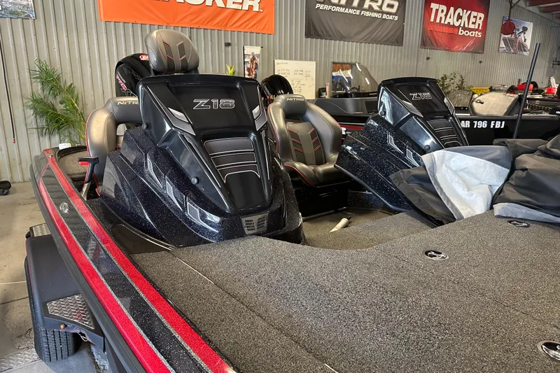 Slide: The Image of 2021 Nitro Z18 Pro fishing boat in showroom with Tracker and Nitro banners. - 15