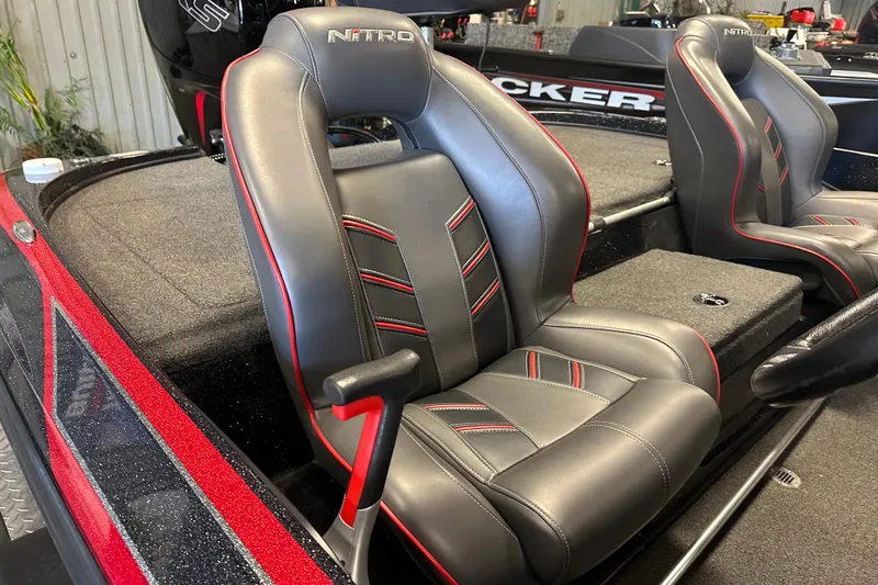 Slide: The Image of Luxurious seating in a 2021 Nitro Z18 Pro boat, featuring sleek black and red design. - 18