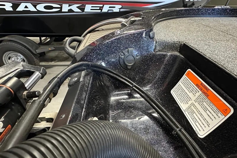 Slide: The Image of Interior view of a 2021 Nitro Z18 Pro boat with wiring and warning label. - 21