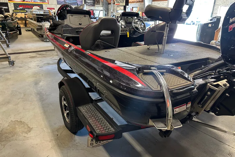 Slide: The Image of Nitro Z18 Pro 2021 boat in showroom, featuring sleek design and modern equipment. - 7