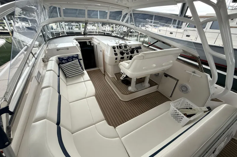 Slide: The Image of Luxurious interior of a 2016 Intrepid 430 Sport Yacht with plush seating and modern helm. - 3