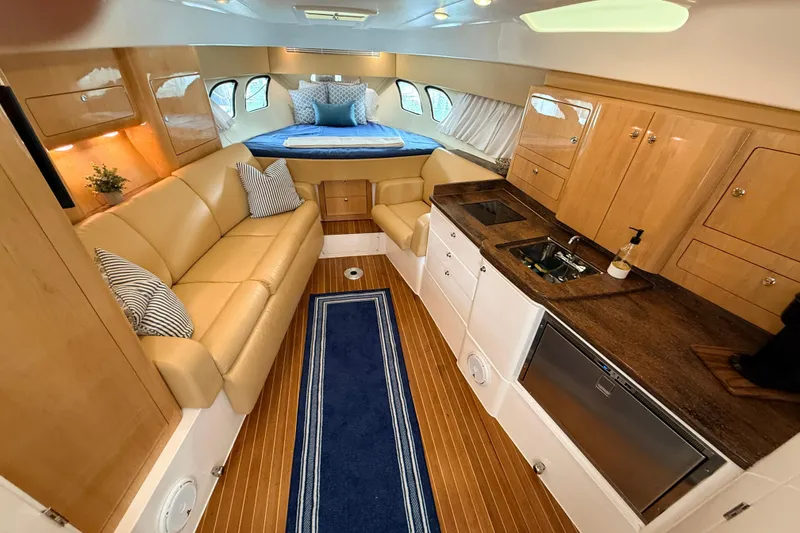 Slide: The Image of Luxurious interior of 2016 Intrepid 430 Sport Yacht with cozy seating and modern amenities. - 4