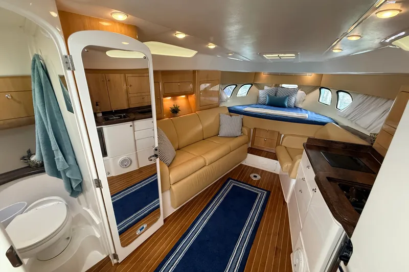 Slide: The Image of Luxurious interior of 2016 Intrepid 430 Sport Yacht with cozy seating and elegant decor. - 6