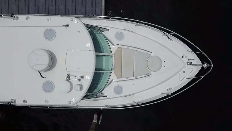 Slide: The Image of Overhead view of 2014 Wellcraft 340 Coastal boat docked at marina. - 10