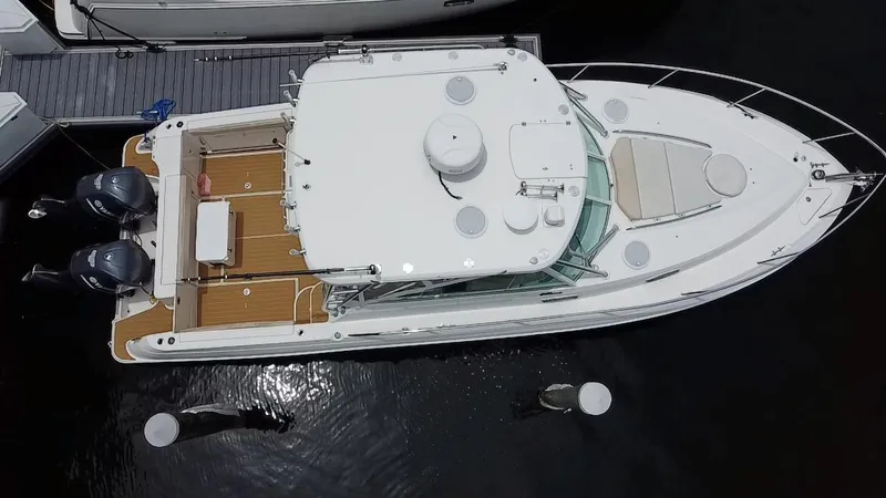 Slide: The Image of Aerial view of 2014 Wellcraft 340 Coastal boat docked at marina. - 7