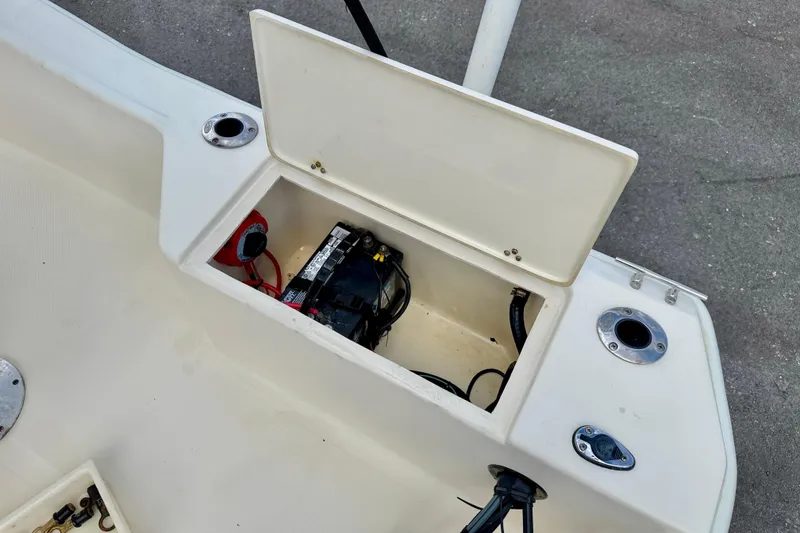 Slide: The Image of Open battery compartment on a 2001 Scout 172 Sportfish boat. - 22