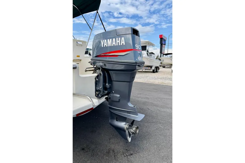 Slide: The Image of Outboard motor on a 2001 Scout 172 Sportfish boat, featuring a Yamaha 90 engine. - 27