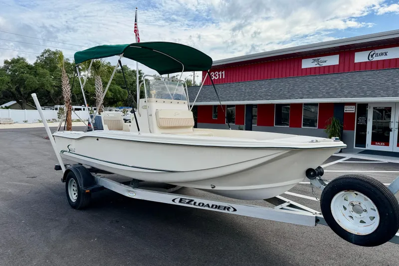 Slide: The Image of 2001 Scout 172 Sportfish boat on trailer outside dealership. - 3