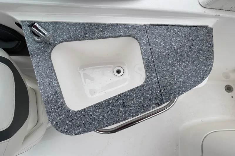 Slide: The Image of Gray countertop with sink on 2014 Chaparral 224 Sunesta boat. - 31