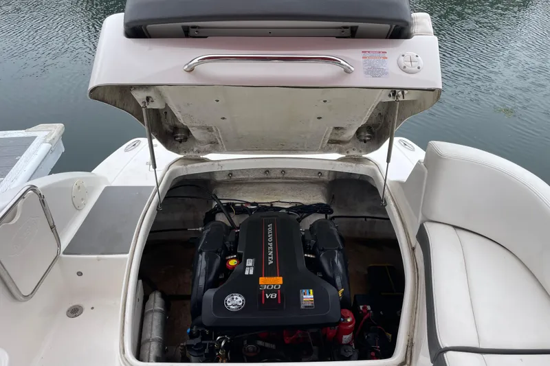 Slide: The Image of 2014 Chaparral 224 Sunesta boat engine compartment with Volvo Penta V8 engine. - 39