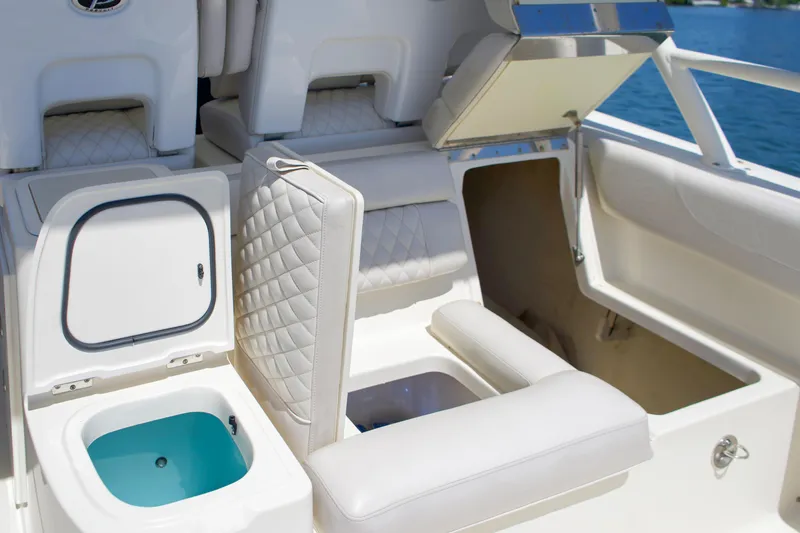 Slide: The Image of Interior of a 2014 Pursuit ST 310 Sport boat. - 14