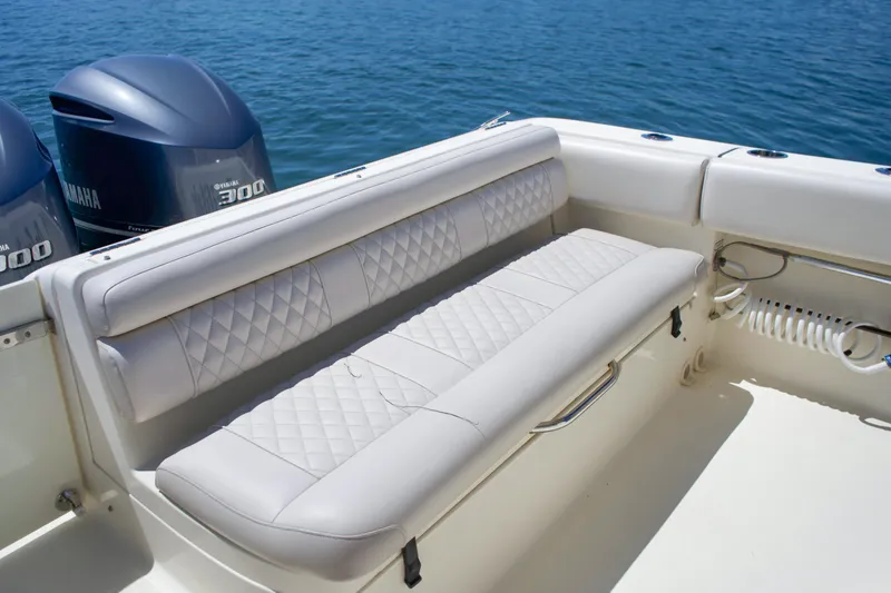 Slide: The Image of 2014 Pursuit ST 310 Sport boat with Yamaha engines. - 15