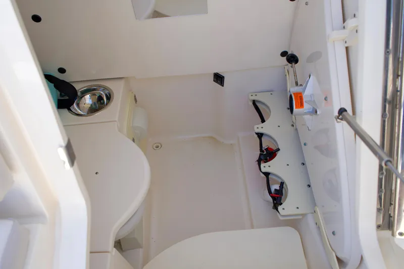 Slide: The Image of Interior of 2014 Pursuit ST 310 Sport with storage and sink. - 17