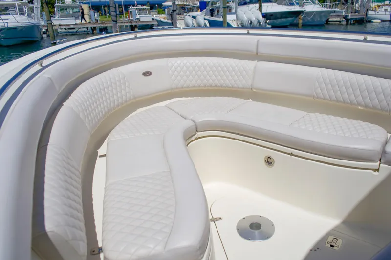Slide: The Image of Luxurious seating on Pursuit ST 310 Sport boat, 2014 model. - 6