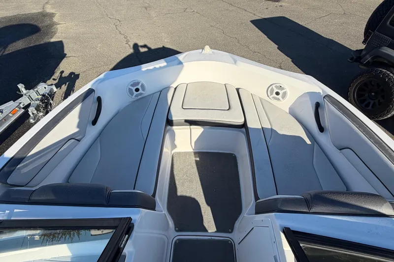 Slide: The Image of 2019 Yamaha Boats SX190 interior with seating and speakers, viewed from above. - 9