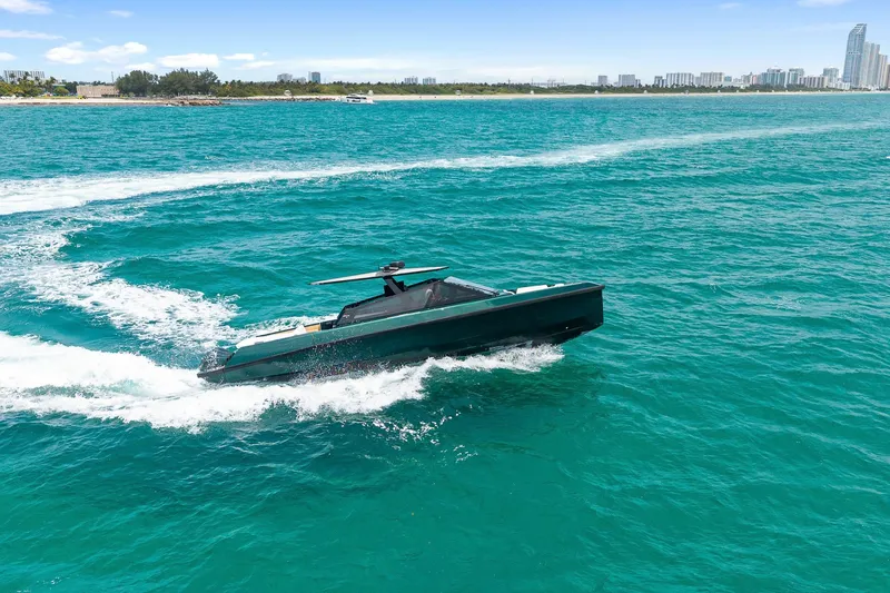Slide: The Image of 2023 Wally wallytender43X yacht cruising on turquoise waters. - 11