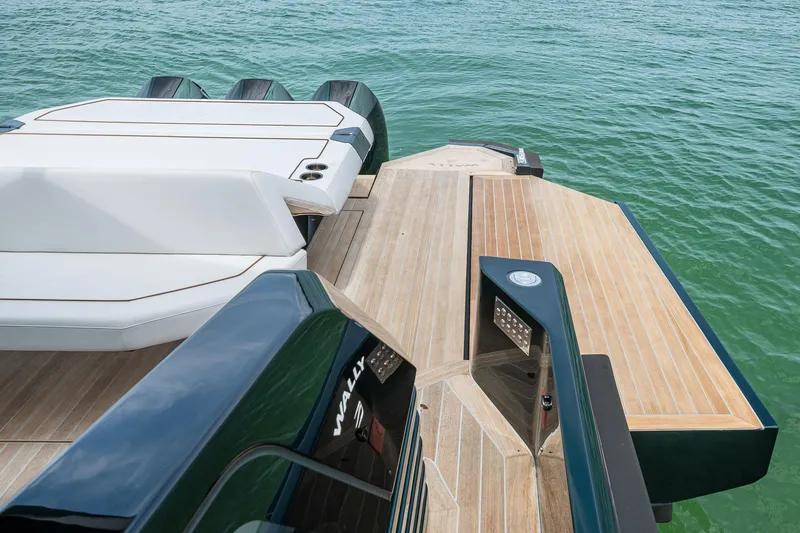 Slide: The Image of Luxurious Wally wallytender43X boat, 2023 model, on calm water. - 12