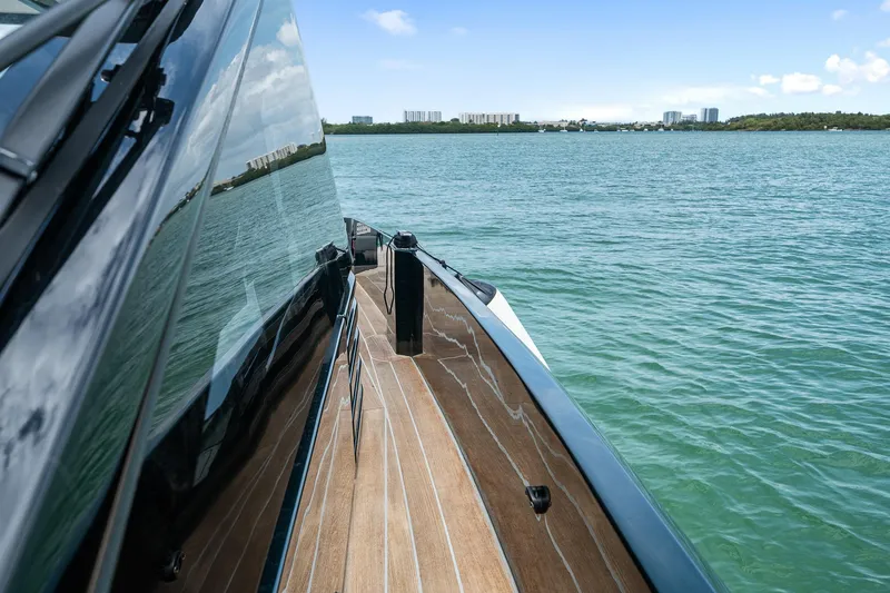 Slide: The Image of Wally wallytender43X 2023 on calm waters with sleek design. - 13